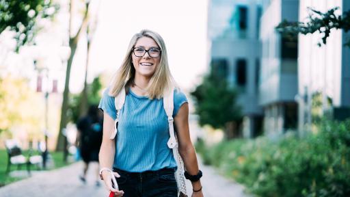 student walking on campus